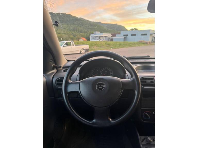 CHEVROLET - CORSA 1.0 MPFI JOY 8V FLEX 4P MANUAL - 2006/2006 - PRATA - R$ 25.900,00