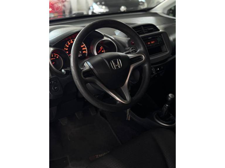 HONDA - FIT 1.4 LX 16V FLEX 4P MANUAL - 2009/2010 - PRATA - R$ 46.900,00